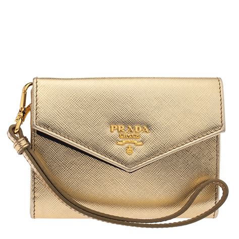 prada saffiano metallic gold leather pouch|Prada Saffiano Gold Leather Bow Wallet with Coin Pouch.